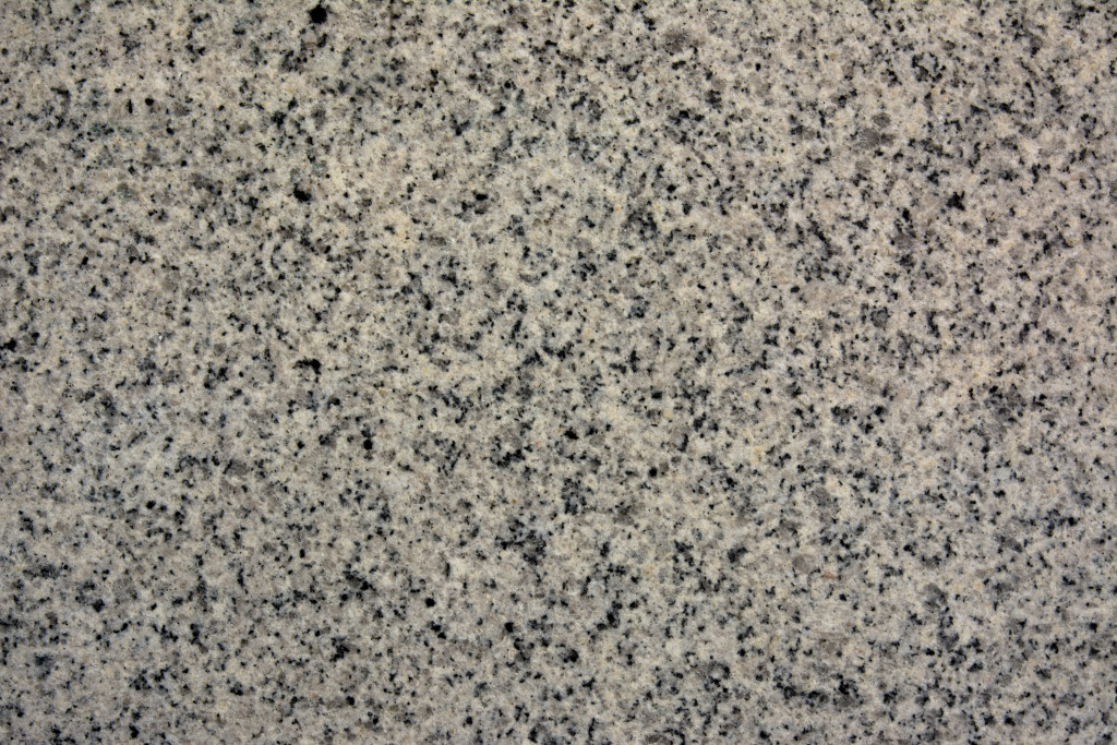 A polished and textured granite countertop
