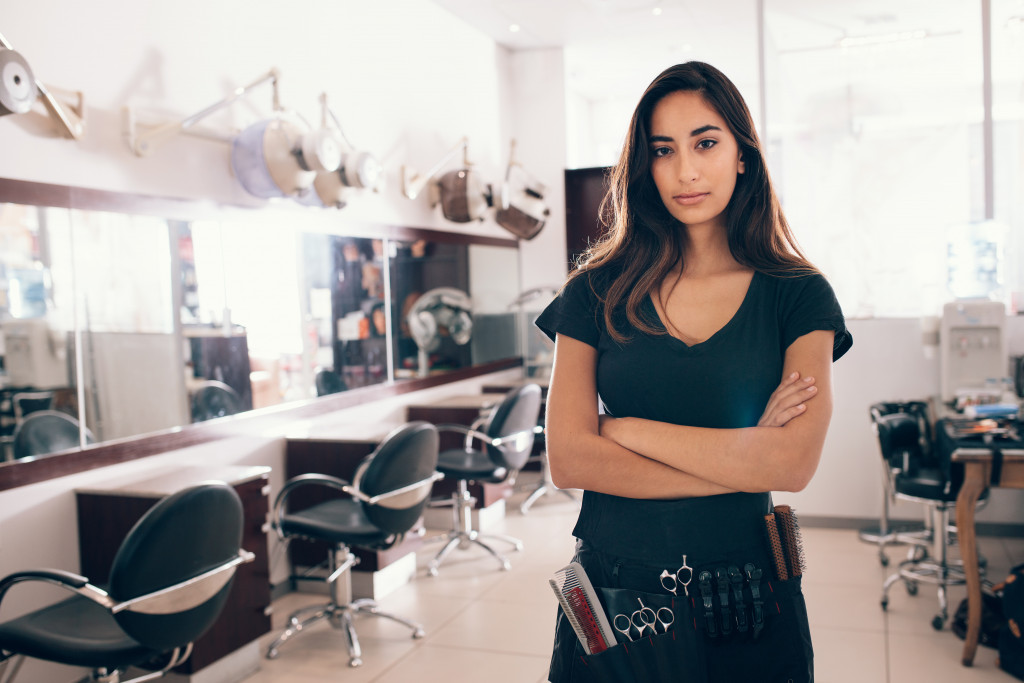 woman standing at a salon