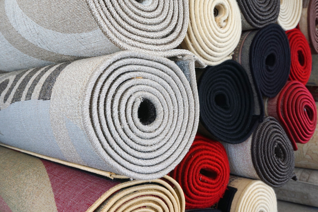 Rolls of rugs or carpets
