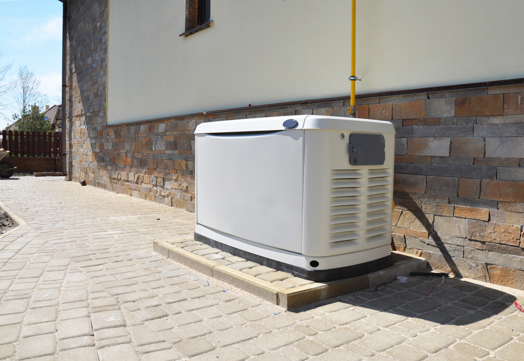 Backup gas generator installed outside a building.